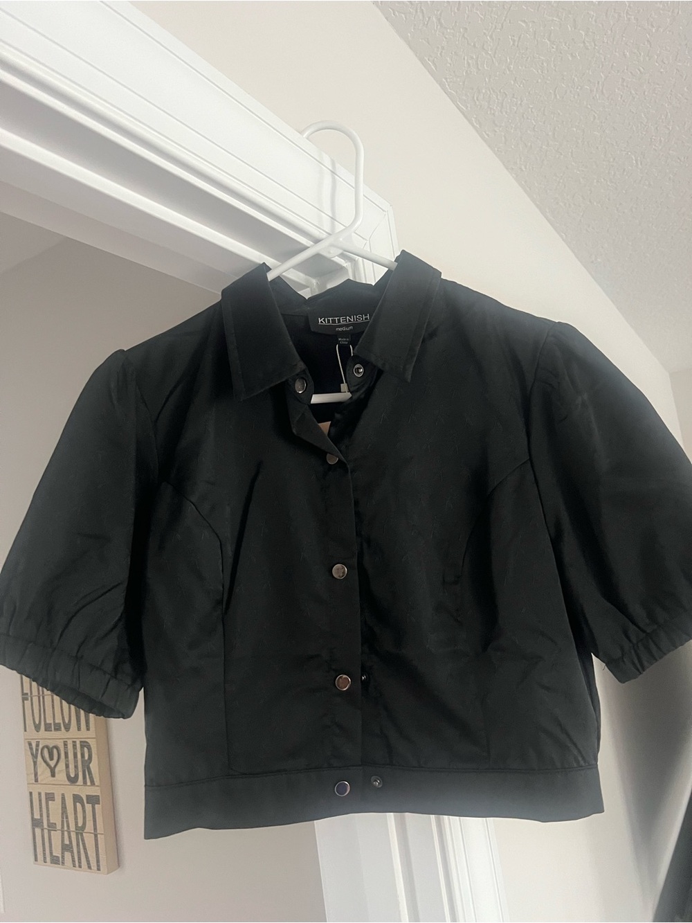 Kittenish Black Textured Cropped Button Jacket